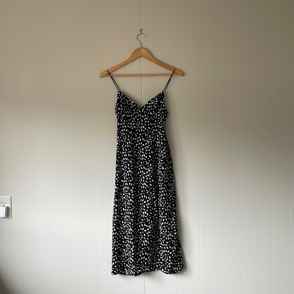 Hello Molly/Fortunate One Black Midi Dress with White Specs and thigh slit
